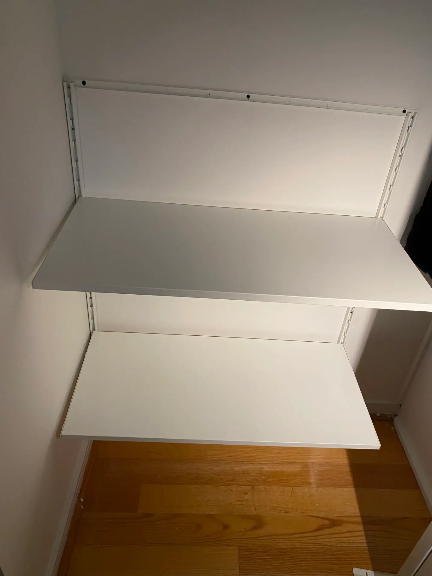 White closet shelves installed by KeyMVP